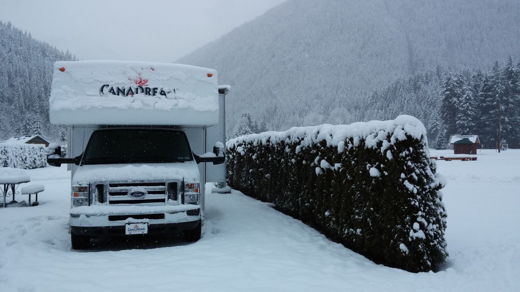 RV in campsite with snow