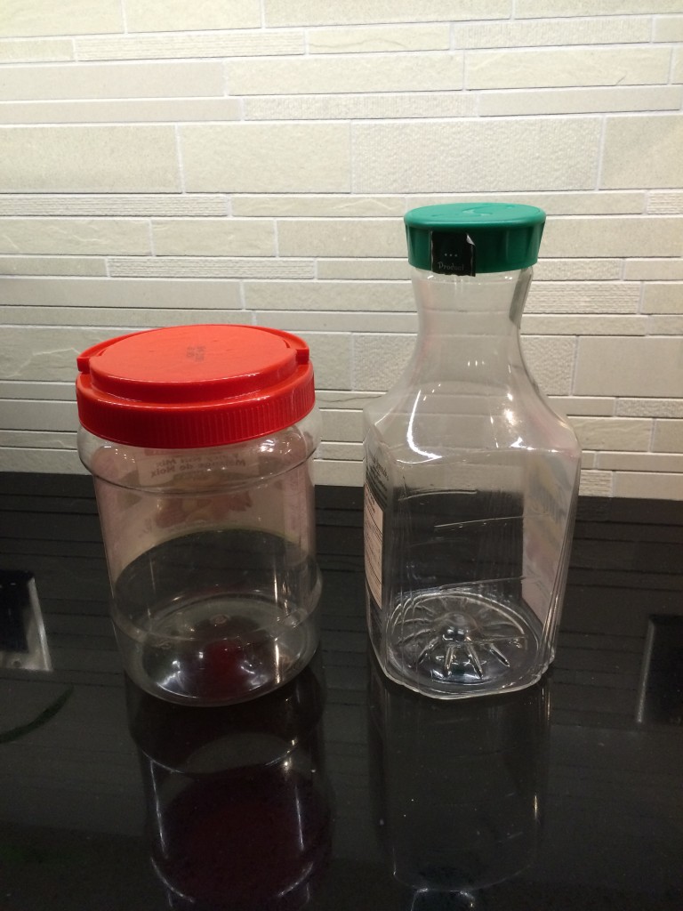 Two empty containers on a counter