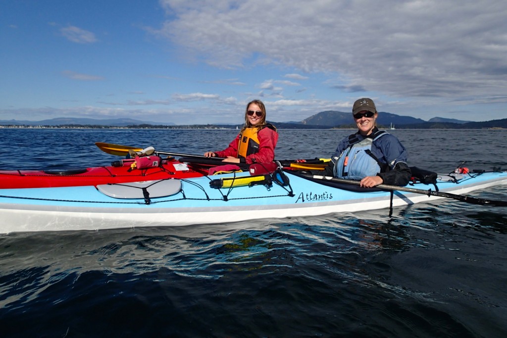 Man and woman kyaking in the Gulf Islands
