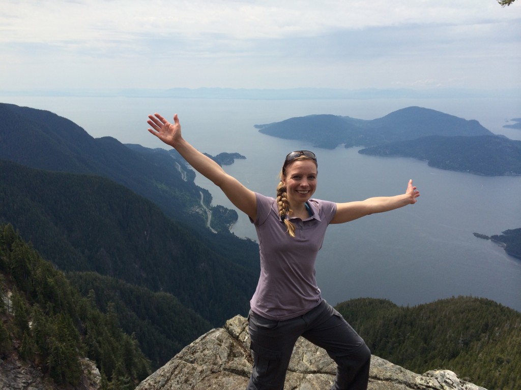 woman on top of a mountain